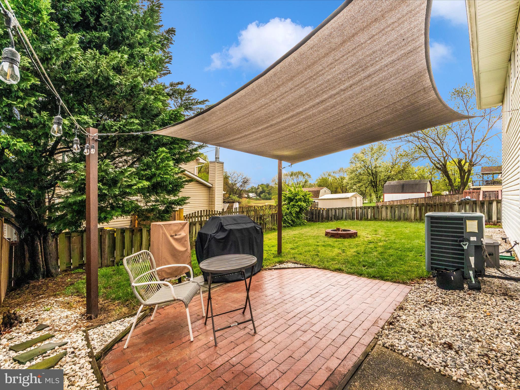 1825 Montreal Road Severn, MD 21144 - Photo 38 of 51 a view of a backyard with sitting area furniture and garden