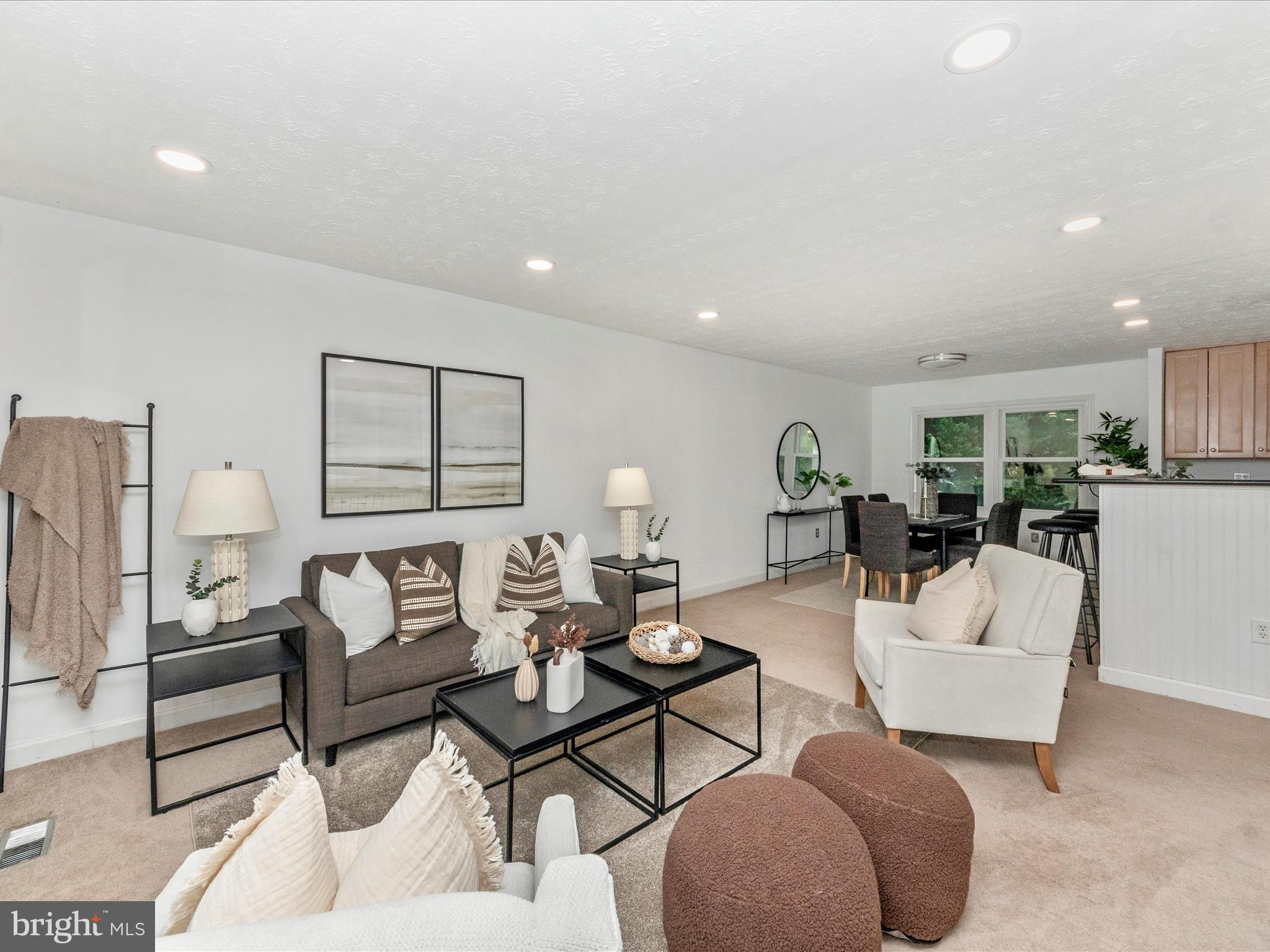 1825 Montreal Road Severn, MD 21144 - Photo 4 of 51 a living room with furniture and a table