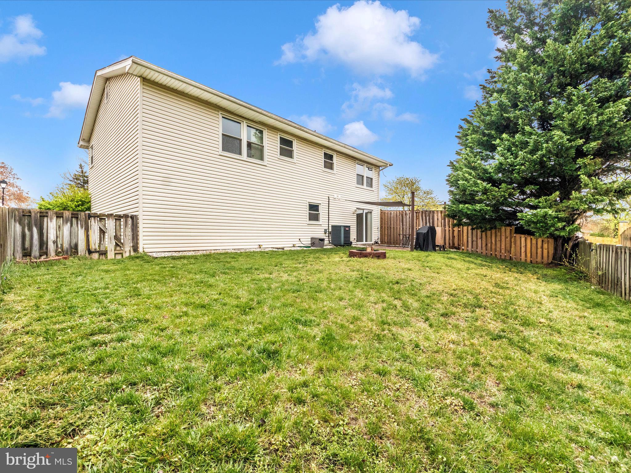 1825 Montreal Road Severn, MD 21144 - Photo 45 of 51 a view of a house with backyard and a tree