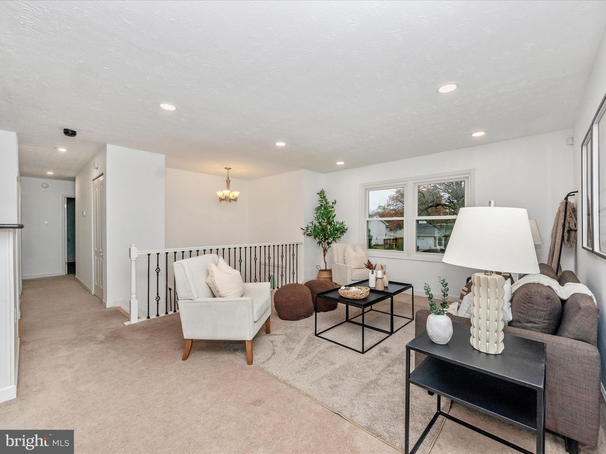1825 Montreal Road Severn, MD 21144 - Photo 7 of 51 a living room with furniture and wooden floor