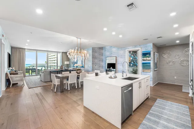 a spacious bathroom with a double vanity sink mirror and shower