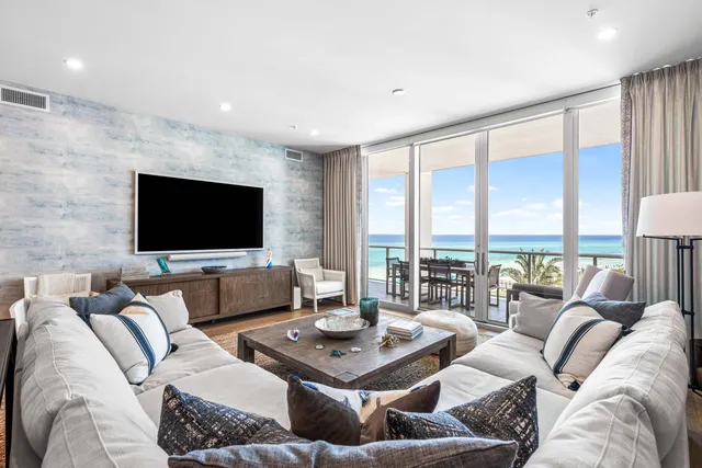 a bathroom with a sink mirror and vanity