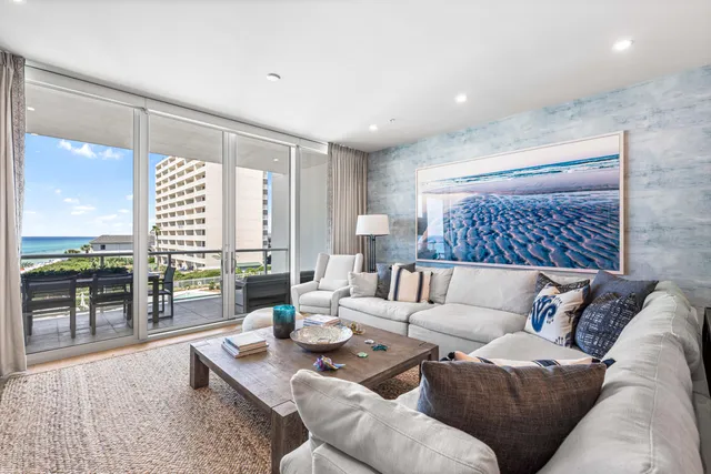 a spacious bedroom with a bed and a couch