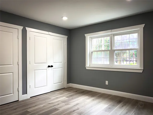 a view of a livingroom with wooden floor