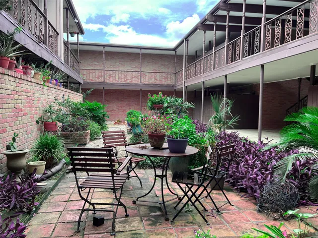 a house view with a outdoor space
