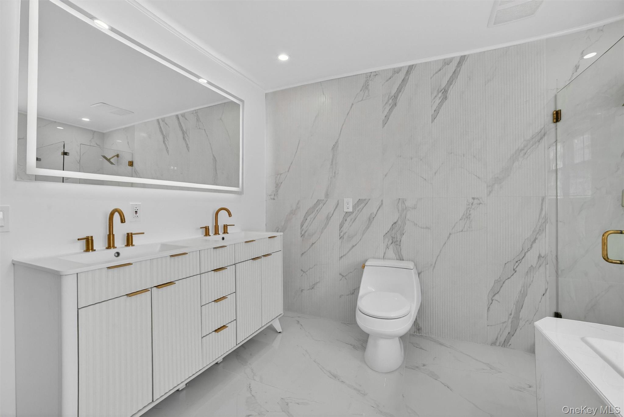 263 Croydon Road Yonkers, NY 10710 - Photo 15 of 43 a bathroom with a toilet sink and mirror
