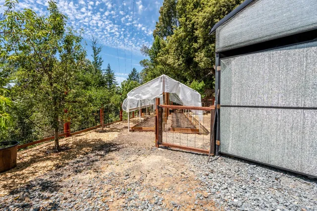 a backyard of a house with lots of green space