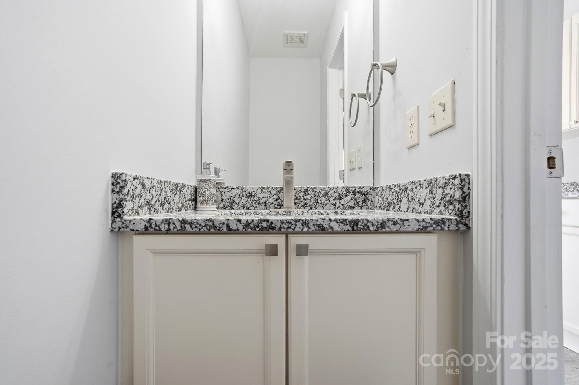 1505 Bellridge Road Rock Hill, SC 29732 - Photo 16 of 48 a bathroom with a granite countertop sink and a mirror