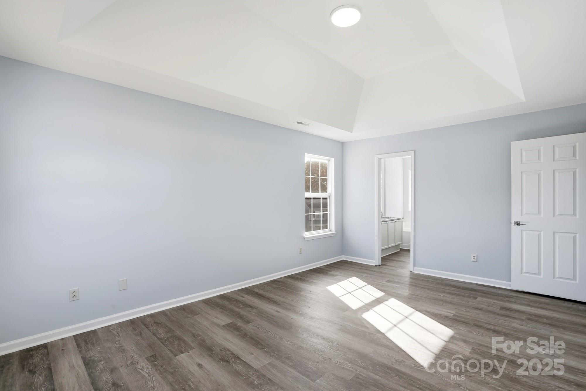 1505 Bellridge Road Rock Hill, SC 29732 - Photo 20 of 48 an empty room with wooden floor and windows