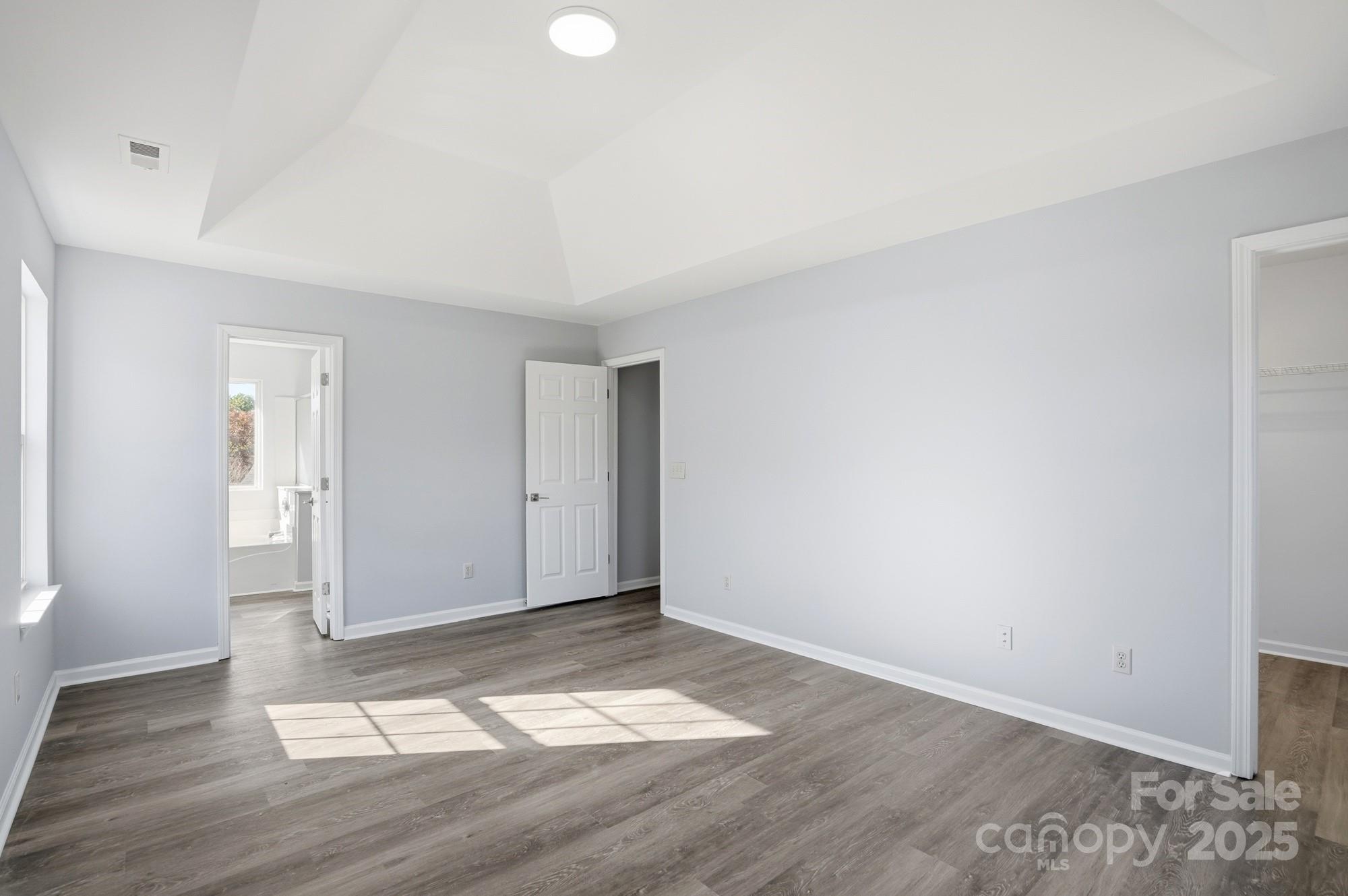1505 Bellridge Road Rock Hill, SC 29732 - Photo 21 of 48 an empty room with wooden floor and windows