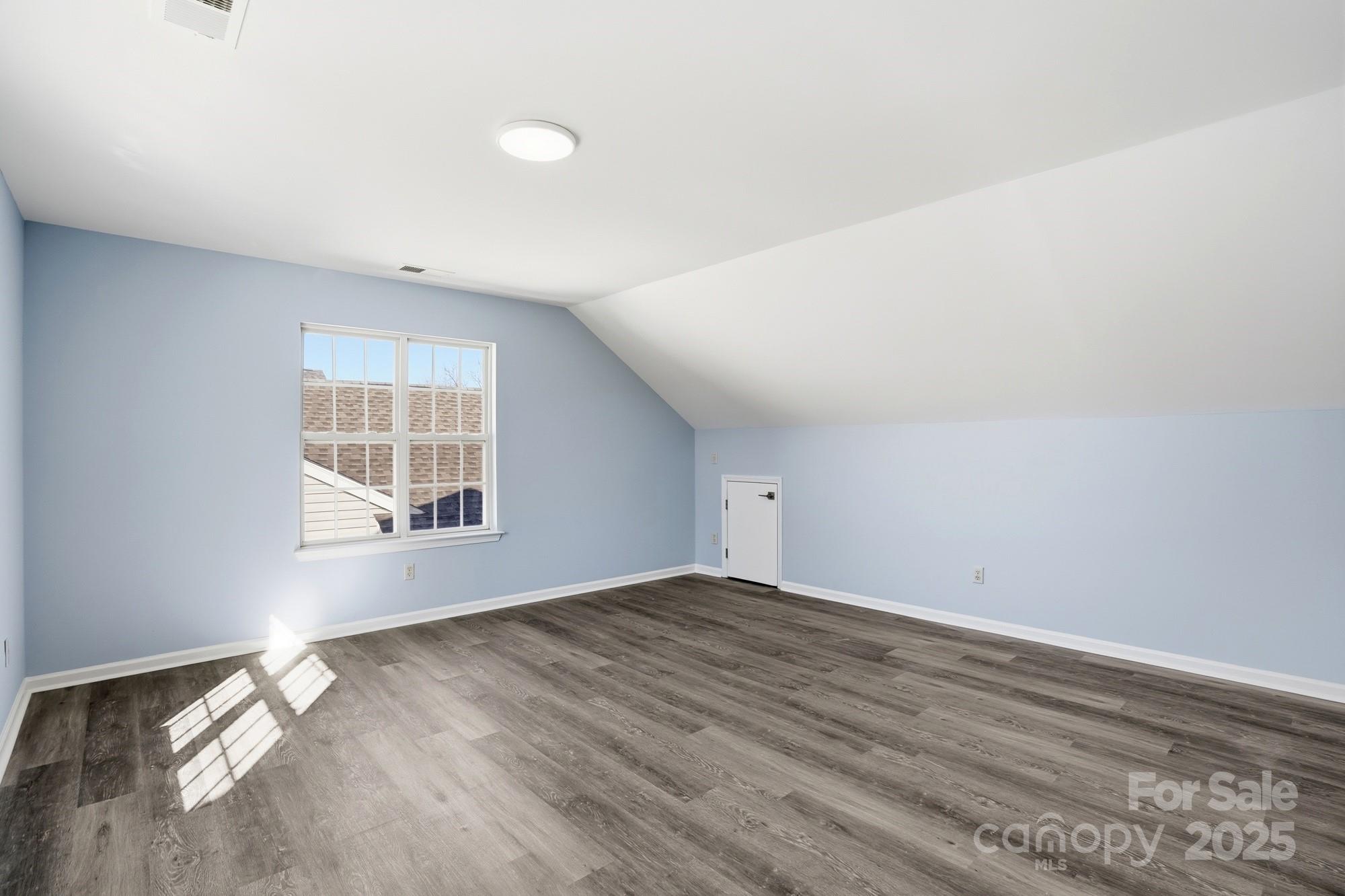 1505 Bellridge Road Rock Hill, SC 29732 - Photo 33 of 48 an empty room with wooden floor and windows