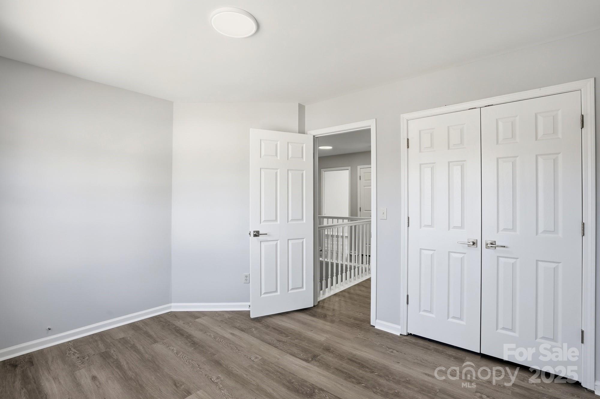 1505 Bellridge Road Rock Hill, SC 29732 - Photo 39 of 48 a view of an empty room and wooden floor