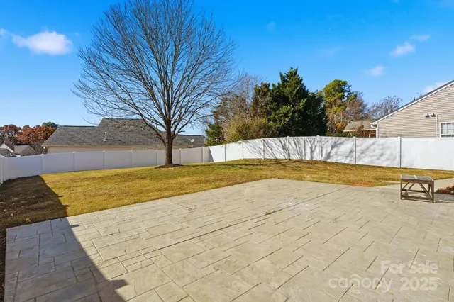a view of swimming pool with a yard