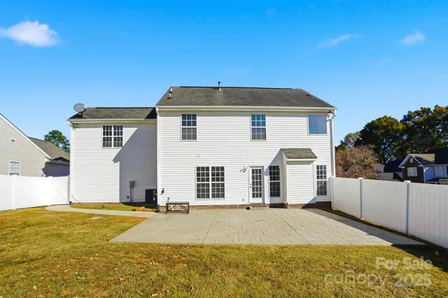 a view of swimming pool with outdoor seating