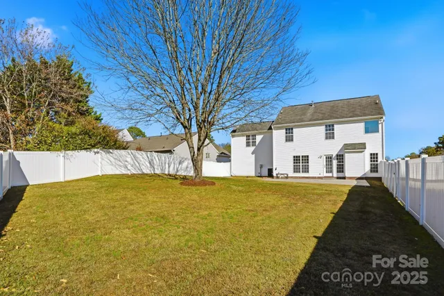 a house with trees in front of it