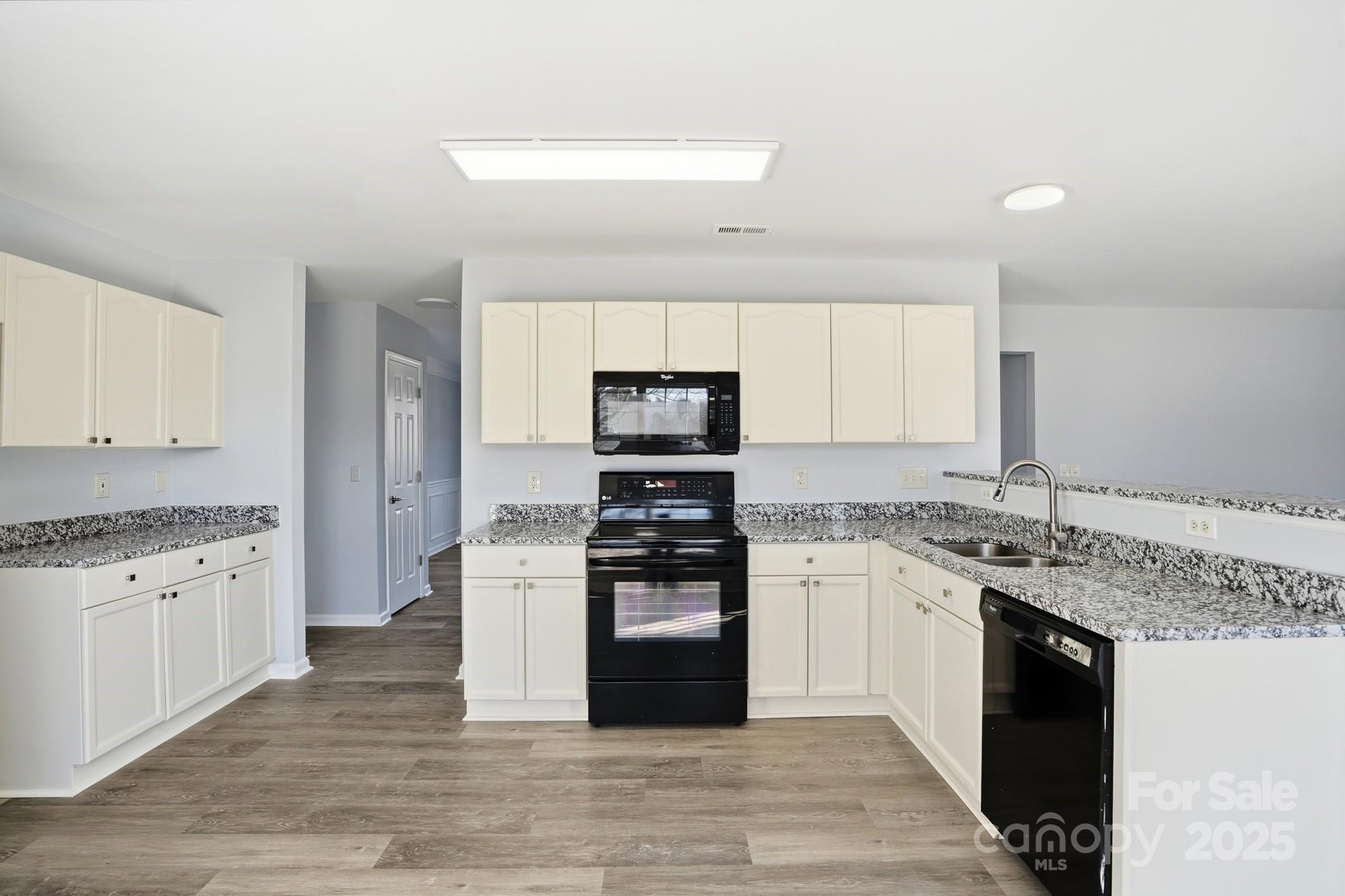 1505 Bellridge Road Rock Hill, SC 29732 - Photo 7 of 48 a kitchen with granite countertop a stove and a sink