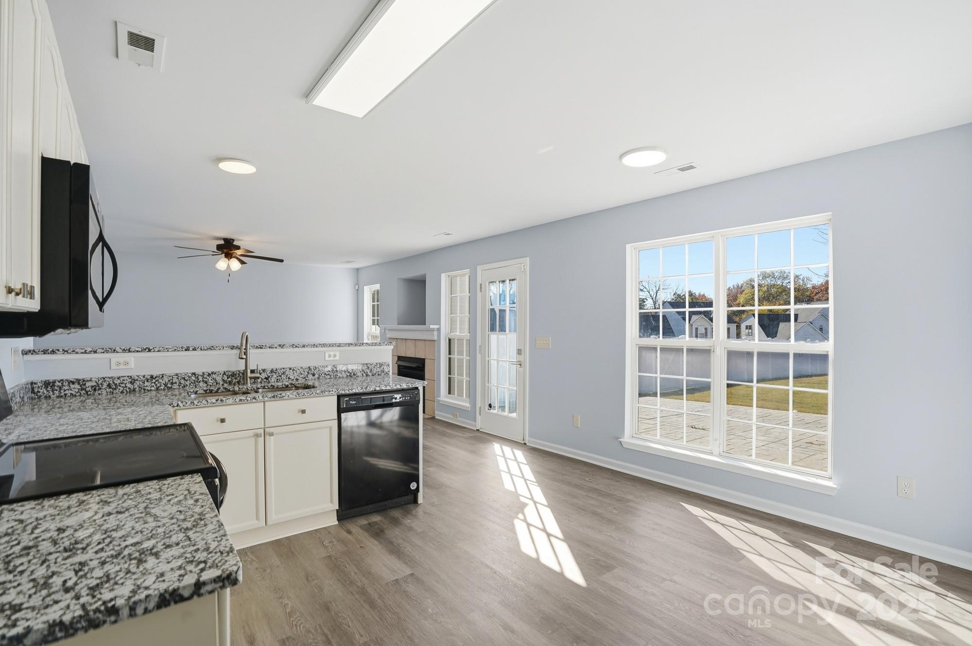 1505 Bellridge Road Rock Hill, SC 29732 - Photo 9 of 48 a kitchen with a stove a sink and a refrigerator