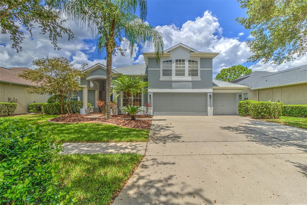 3623 Cordgrass Drive Valrico, FL 33596 - Photo 1 of 1 a front view of a house with garden