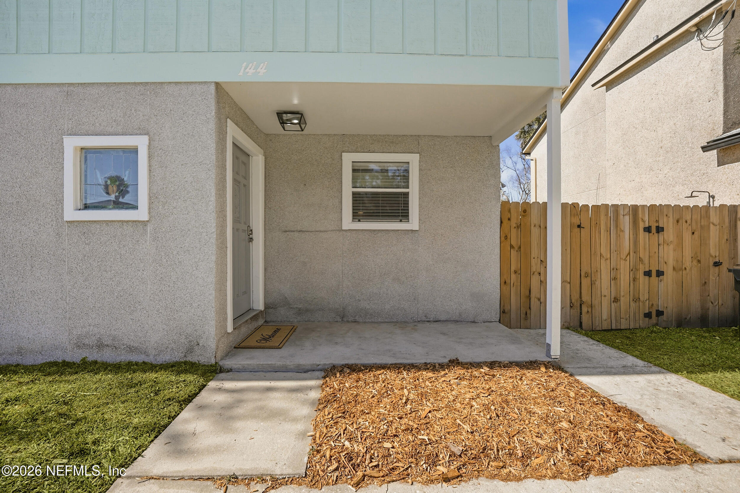 144 Poinsettia Street Atlantic Beach, FL 32233 - Photo 2 of 42 a view of a big room with a rug