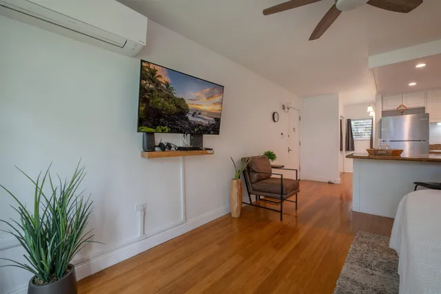 a view of livingroom with furniture and wooden floor