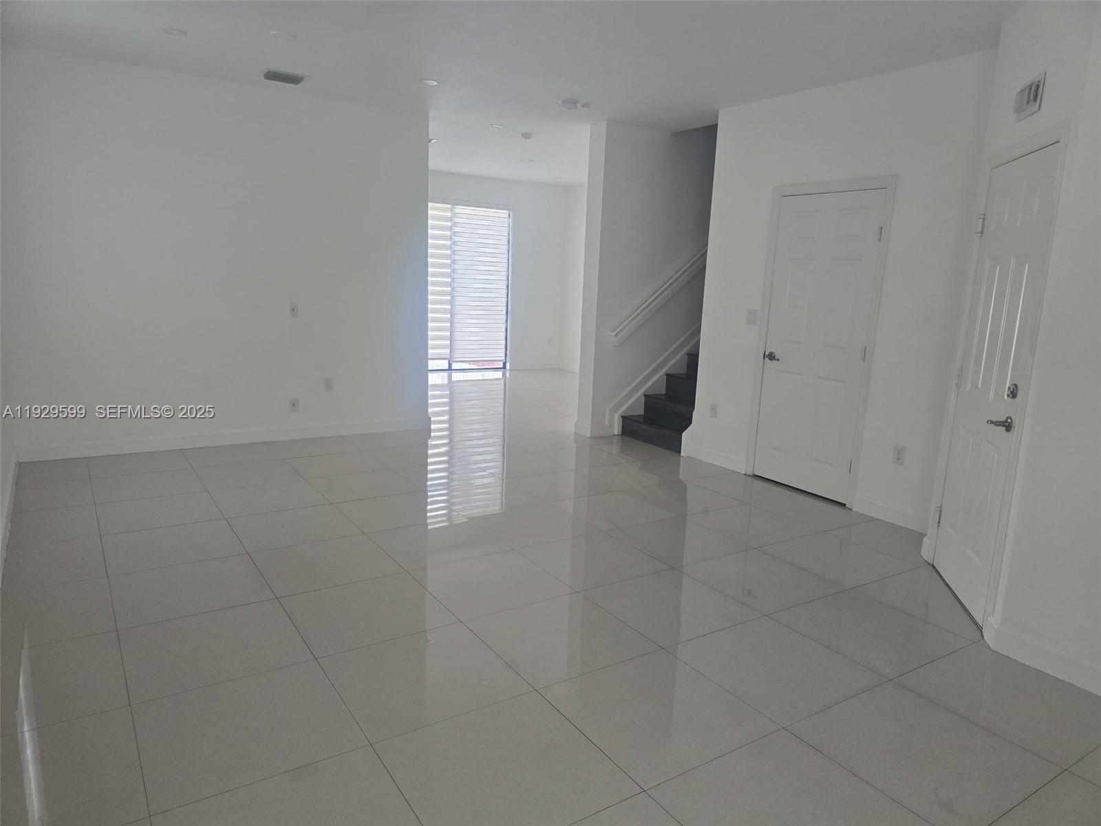 3399 West 90th Terrace Hialeah, FL 33018 - Photo 13 of 59 a view of an empty room