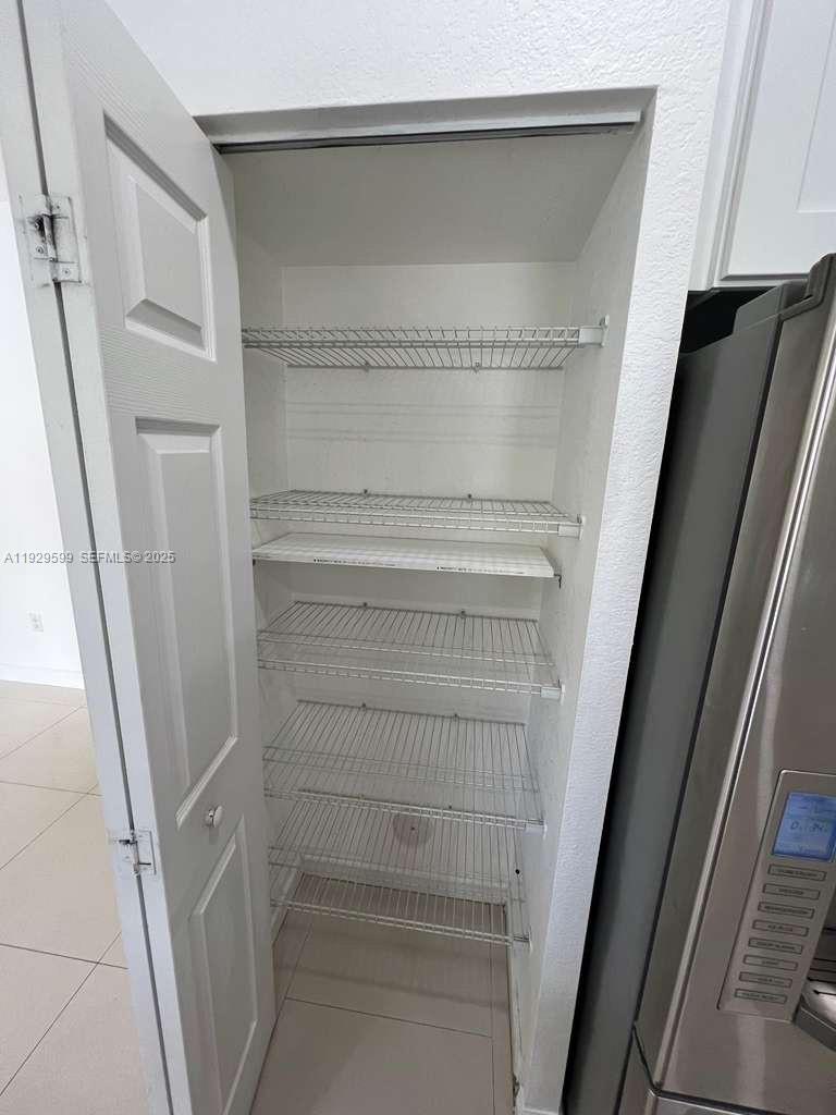 3399 West 90th Terrace Hialeah, FL 33018 - Photo 45 of 59 a view of walk in closet