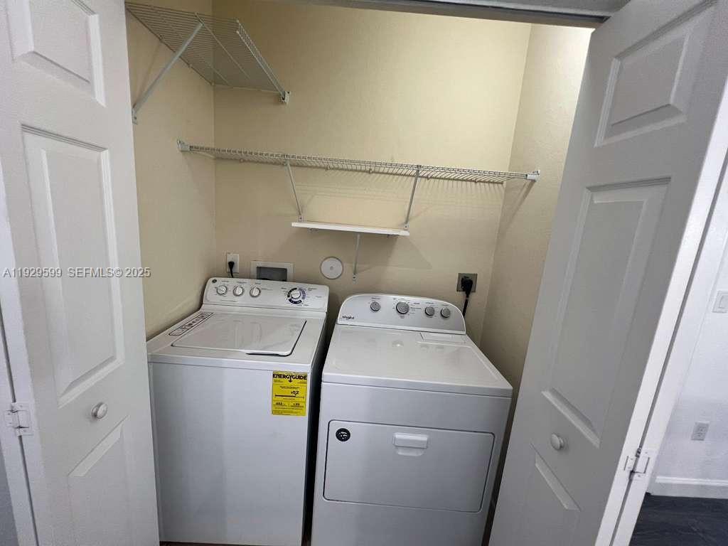 3399 West 90th Terrace Hialeah, FL 33018 - Photo 57 of 59 a utility room with dryer and washer