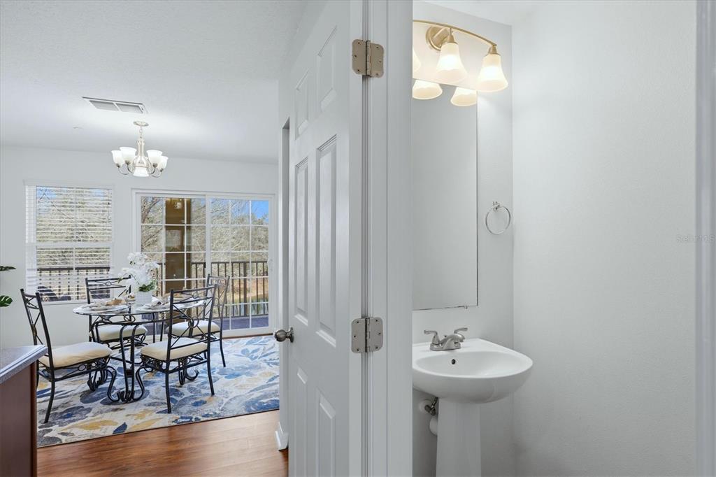 9038 White Sage Loop Lakewood Ranch, FL 34202 - Photo 31 of 52 a bathroom with a sink and a mirror