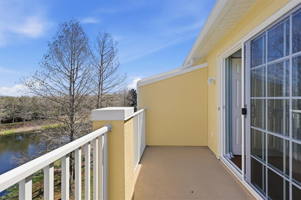 9038 White Sage Loop Lakewood Ranch, FL 34202 - Photo 38 of 52 a view of a house with backyard and wooden fence