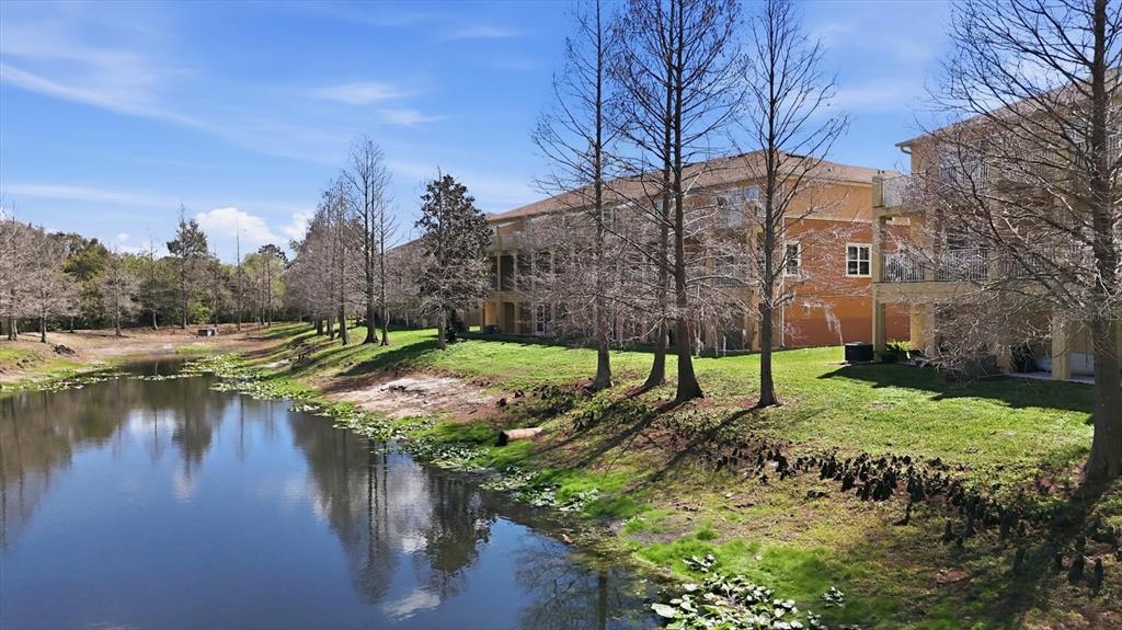 9038 White Sage Loop Lakewood Ranch, FL 34202 - Photo 41 of 52 a view of a garden with a house