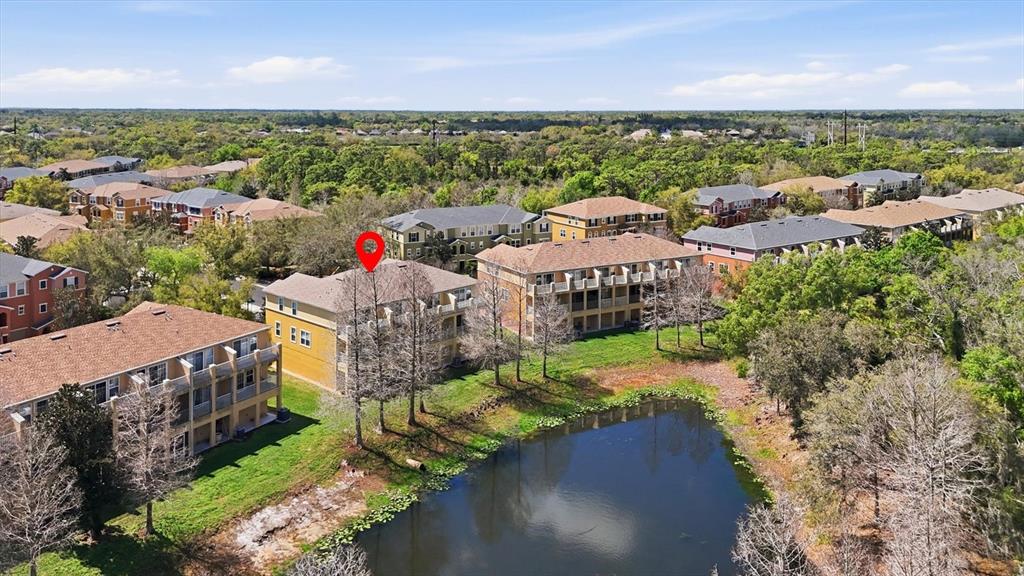 9038 White Sage Loop Lakewood Ranch, FL 34202 - Photo 44 of 52 a aerial view of a house with a yard basket ball court and outdoor seating