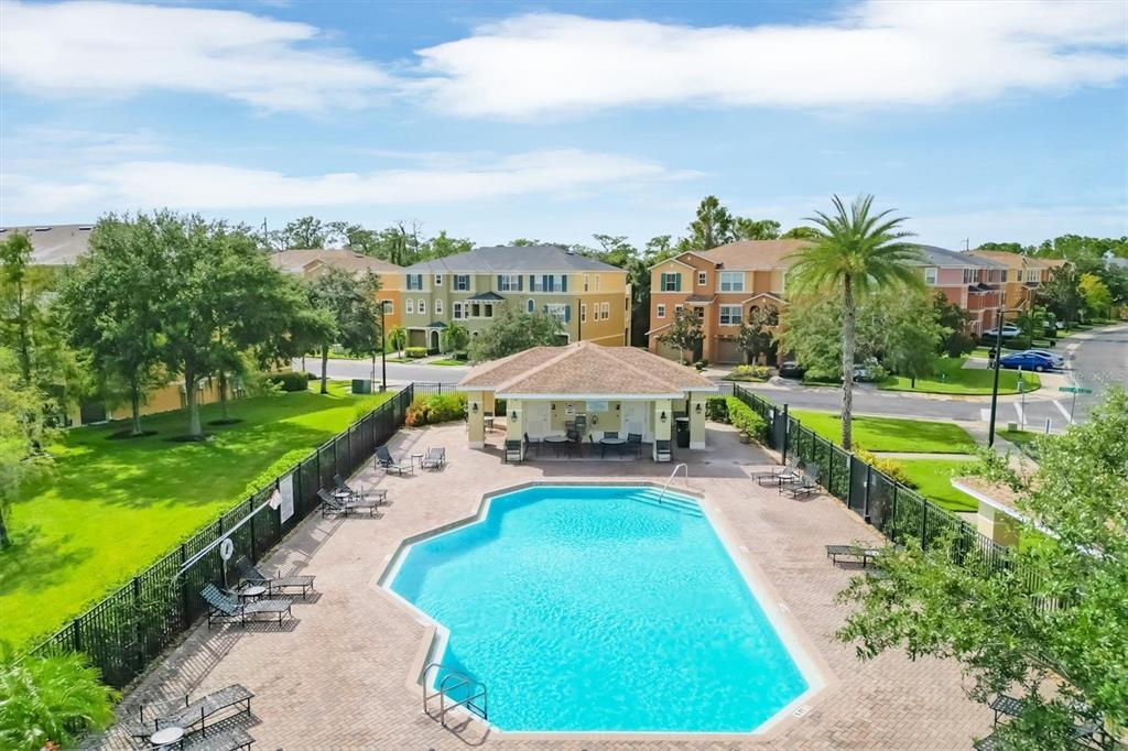 9038 White Sage Loop Lakewood Ranch, FL 34202 - Photo 49 of 52 a swimming pool with outdoor seating and yard