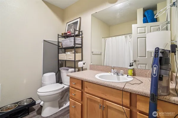 a bedroom with furniture and a bed