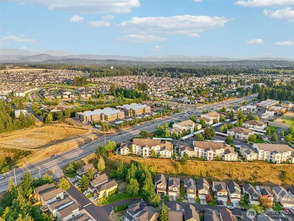 an aerial view of beach and city