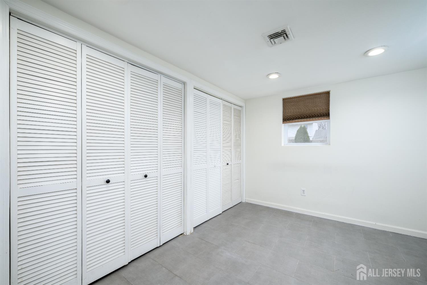 178 Grant Avenue Colonia, NJ 07067 - Photo 27 of 39 a view of a livingroom with an entryway
