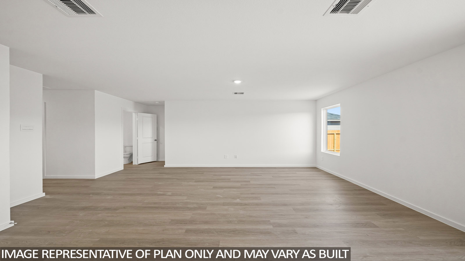 176 Baby Calf Roping Road Jarrell, TX 76537 - Photo 7 of 23 a view of an empty room with wooden floor