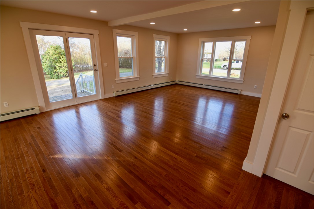 584 Bound Road Woonsocket, RI 02895 - Photo 11 of 35 Great room with oak hardwoods