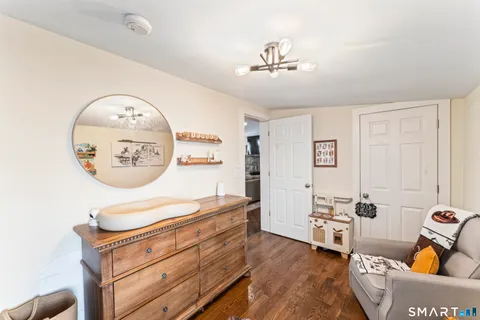a living room with furniture and a table