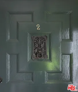 a sign that is on a refrigerator in a bathroom