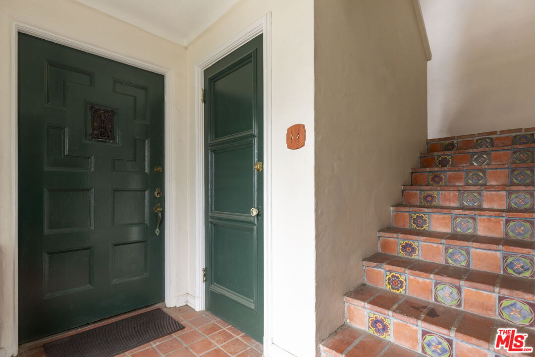 6366 Orange Street Los Angeles, CA 90048 - Photo 6 of 17 a view of entryway with bathroom and front door