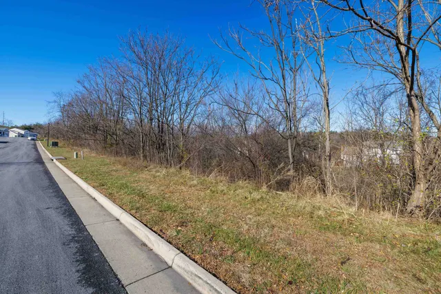 a view of swimming pool from a balcony