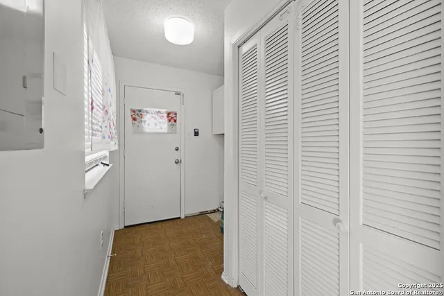 a view of an entryway with a window