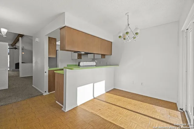 a bathroom with a sink a mirror and a shower