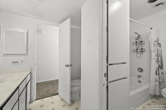 a view of a livingroom with wooden floor