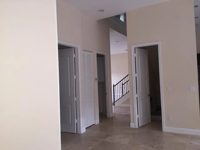 a view of a hallway with closet