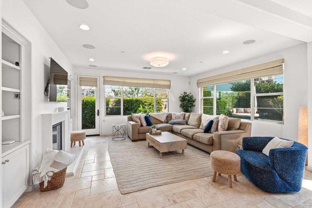 809 Dolphin Circle Encinitas, CA 92024 - Photo 24 of 71 a living room with furniture and a large window