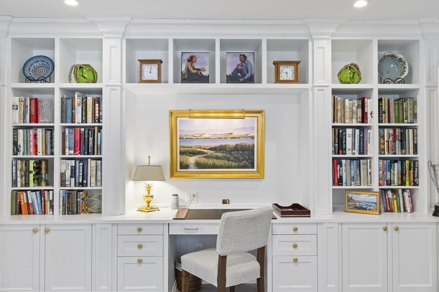 25 Oakdale Path Barnstable, MA 02655 - Photo 17 of 42 a view of a workspace with bookshelf