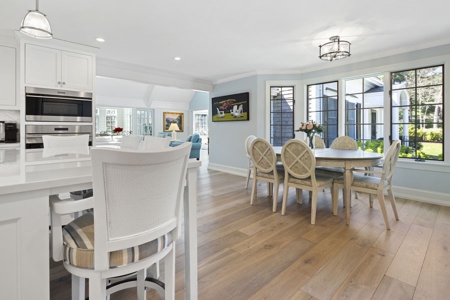 25 Oakdale Path Barnstable, MA 02655 - Photo 29 of 42 a view of a dining room with furniture window and wooden floor