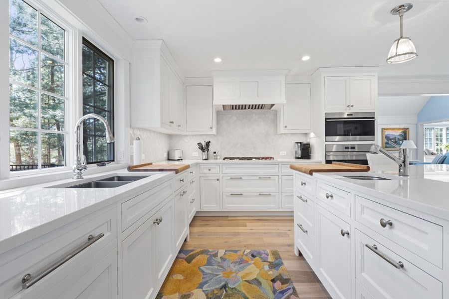 25 Oakdale Path Barnstable, MA 02655 - Photo 31 of 42 a kitchen with kitchen island granite countertop a sink appliances cabinets and a window