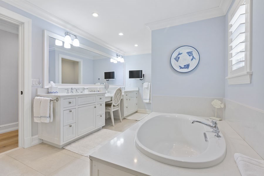 25 Oakdale Path Barnstable, MA 02655 - Photo 35 of 42 a bathroom with a double vanity sink mirror and bathtub
